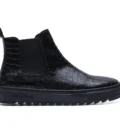 Made in Italy Chelsea boot in black leather with a deep crocodile print, for those who love to stand out with style. The reptile-patterned upper gives visual and material strength to the silhouette, while the serrated black rubber sole ensures urban comfort and personality.