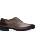 Shop black wholecut Oxford shoes made in Italy, handcrafted from a single piece of premium calfskin leather. Minimal, elegant, and designed for true luxury. Order now